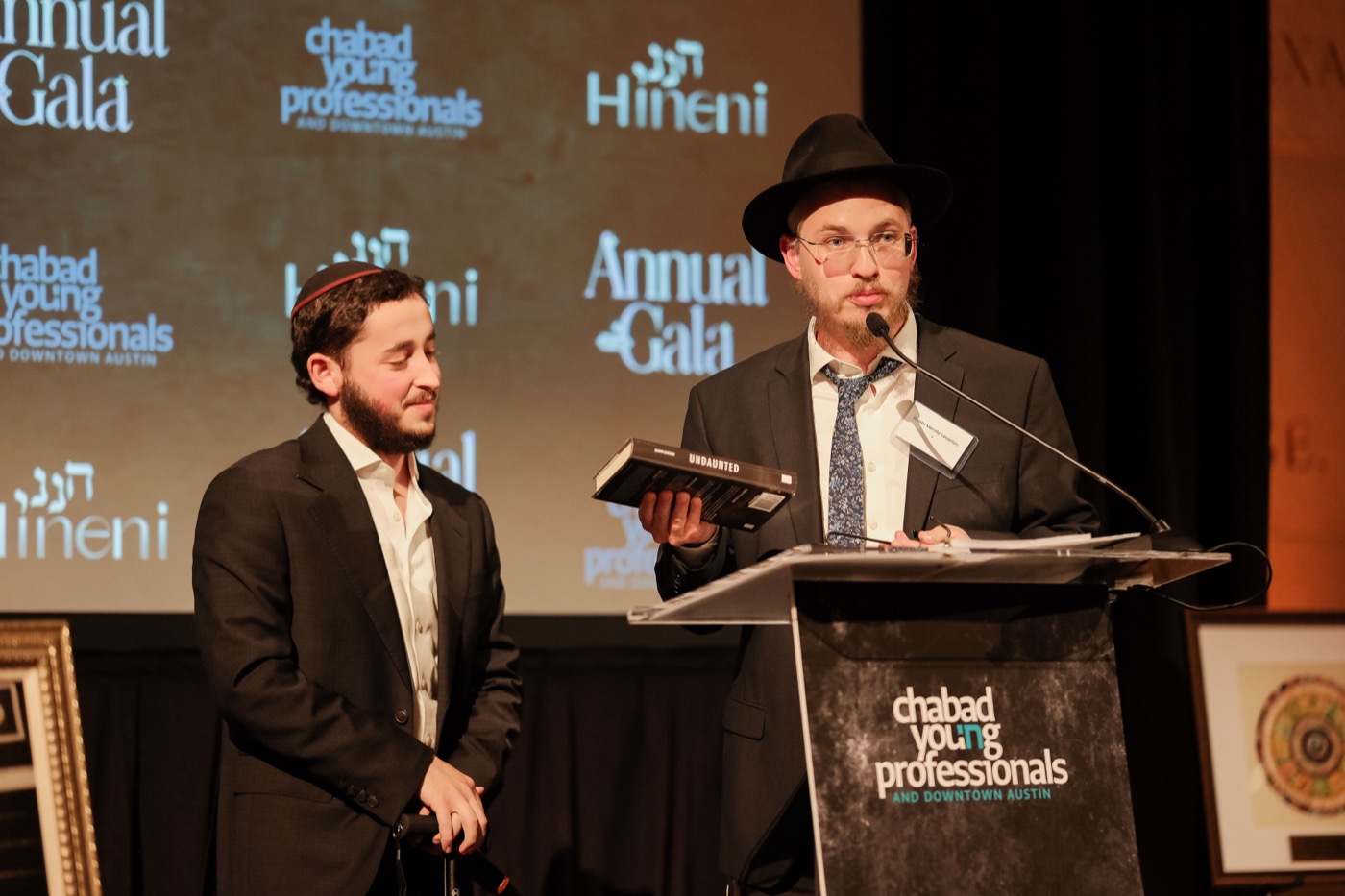 Speaking at the podium